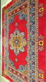 farsh-dastbaft-qashqai-lolbaft-lachak-toranj-gol-abrisham-dastris-45raj-rang-giahi-red-blue-300x200.jpg
