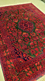 premium-merino-handwoven-rug-red-green-persian.jpg