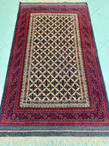 قالیچه دستباف کارکرده برگ تاکی ۱۷۰×۱۰۰؛ تمام پشم و رنگ گیاهی