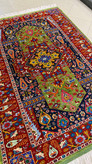 farsh-dastbaft-qashqai-gol-abresham-140x205-rang-giyahi.jpg